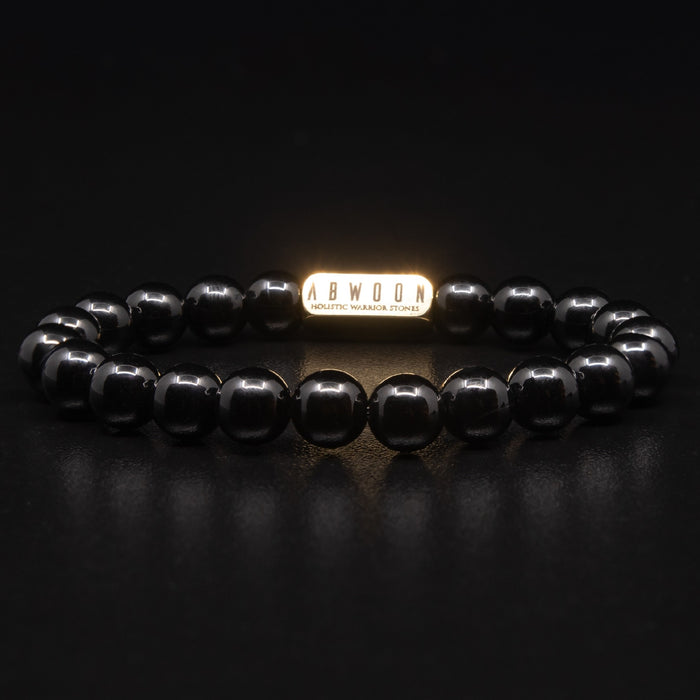 POLISHED BLACK ONYX BRACELET WITH GOLD ACCENT