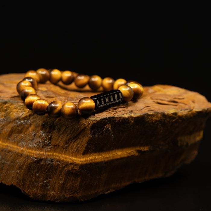 Tiger's Eye bracelet on raw tiger's eye rock