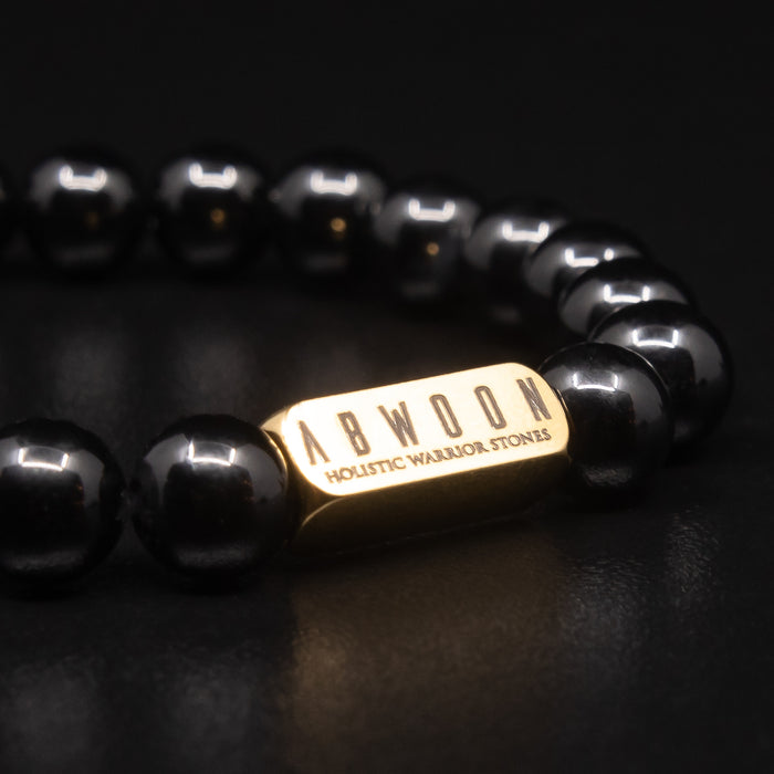 POLISHED BLACK ONYX BRACELET WITH GOLD ACCENT