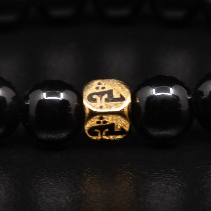 POLISHED BLACK ONYX BRACELET WITH GOLD ACCENT